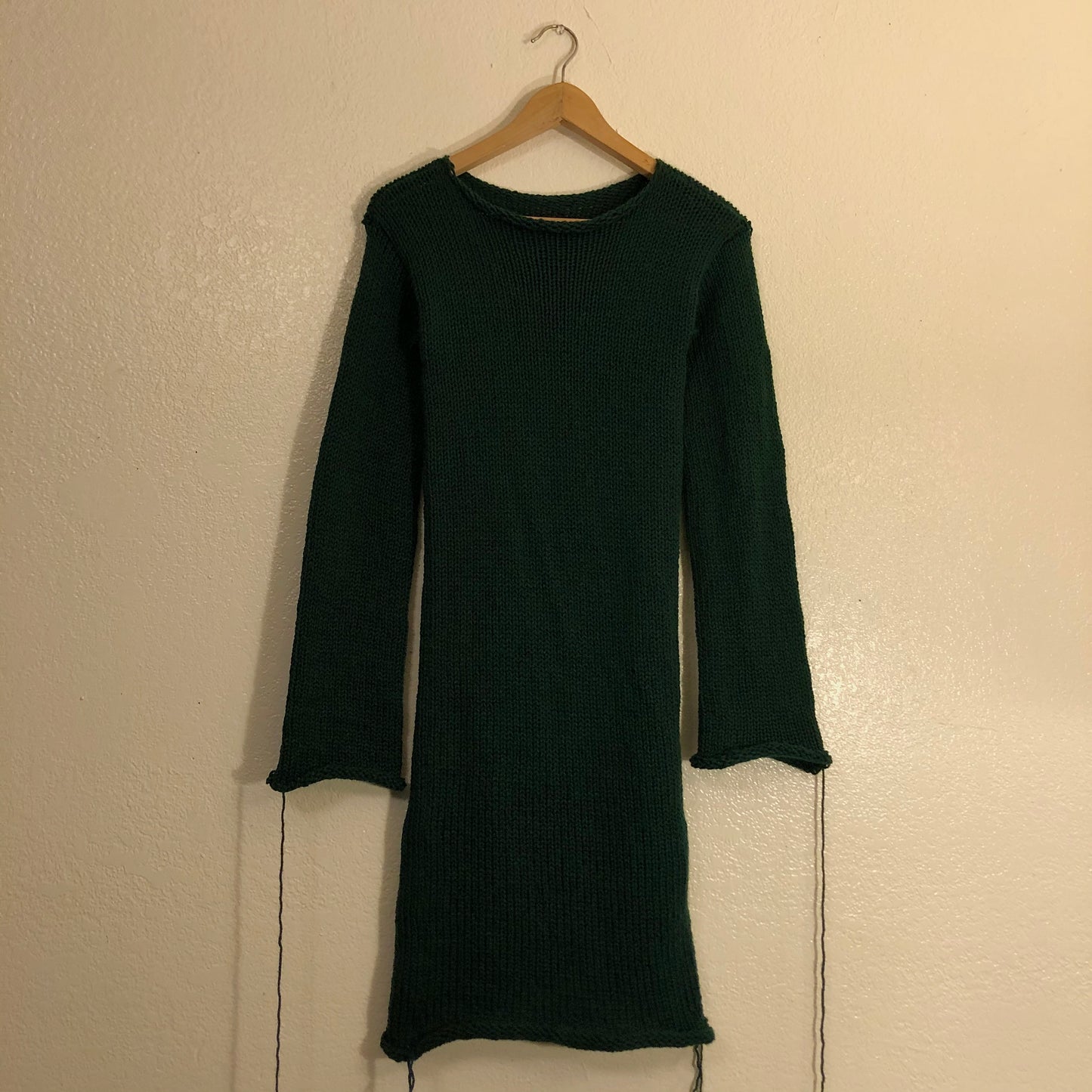 Long sleeve knitted dress in a dark emerald green 